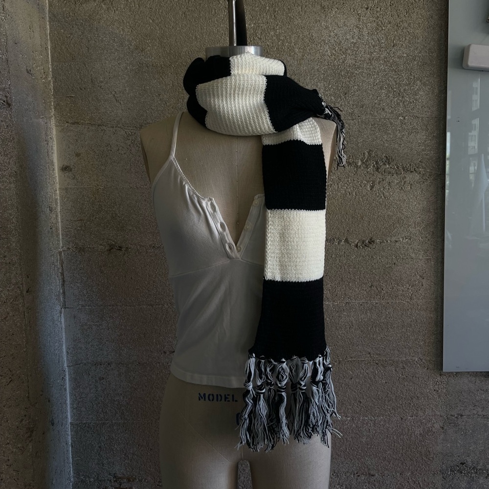 Black and white striped knit scarf w/ tassels